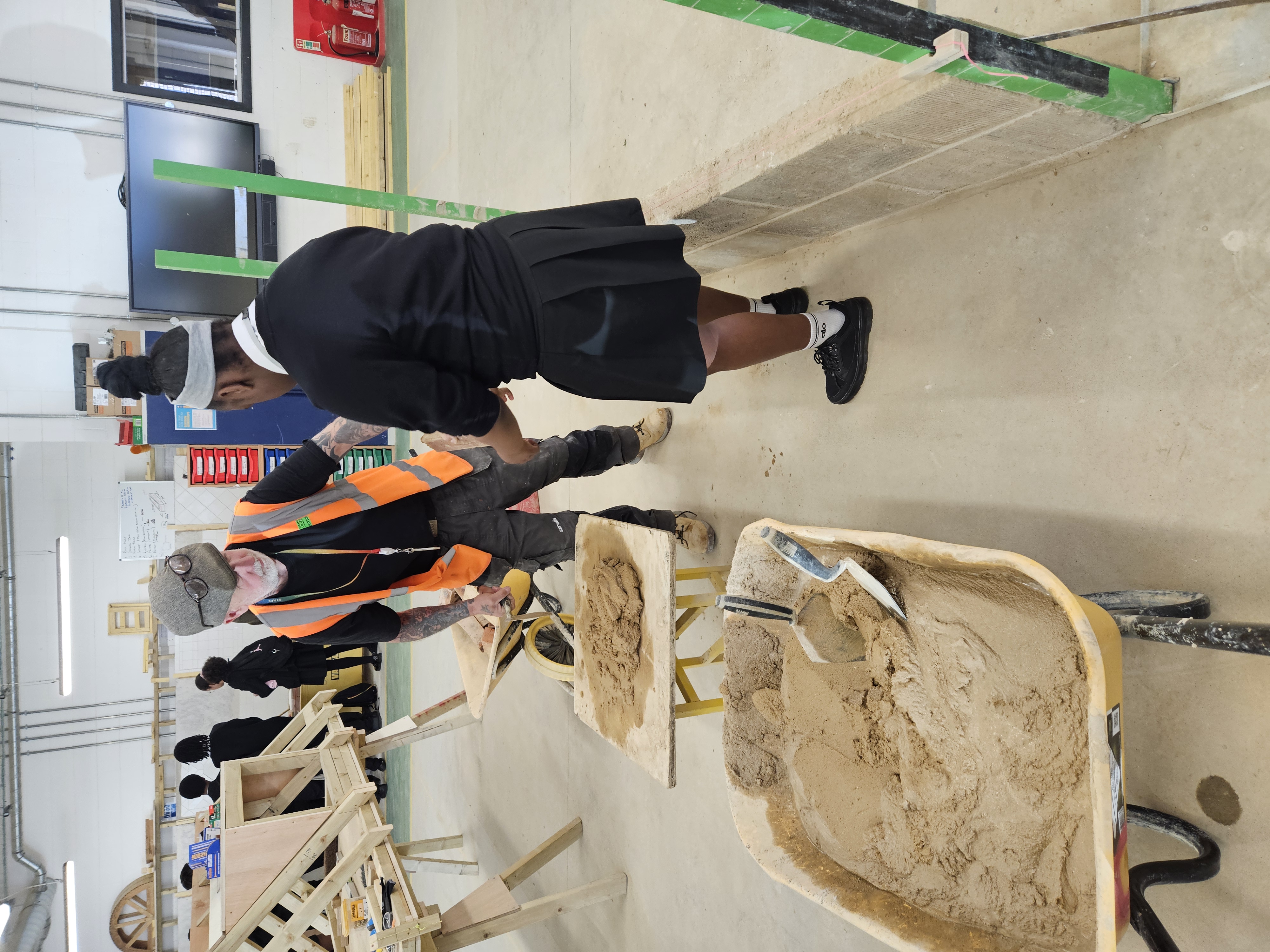 Student participating in Bricklaying