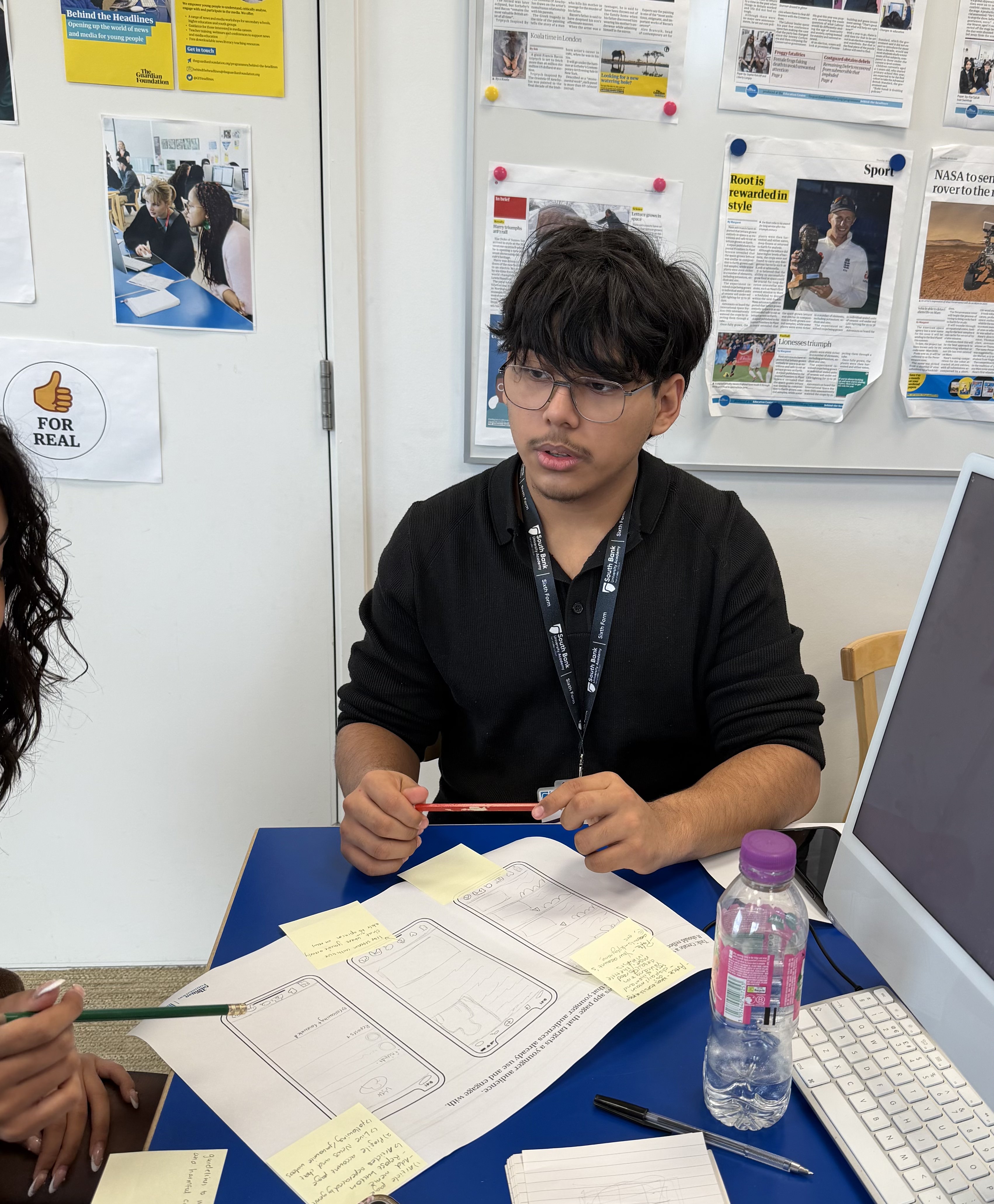 Student in a discussion with partner on the activity