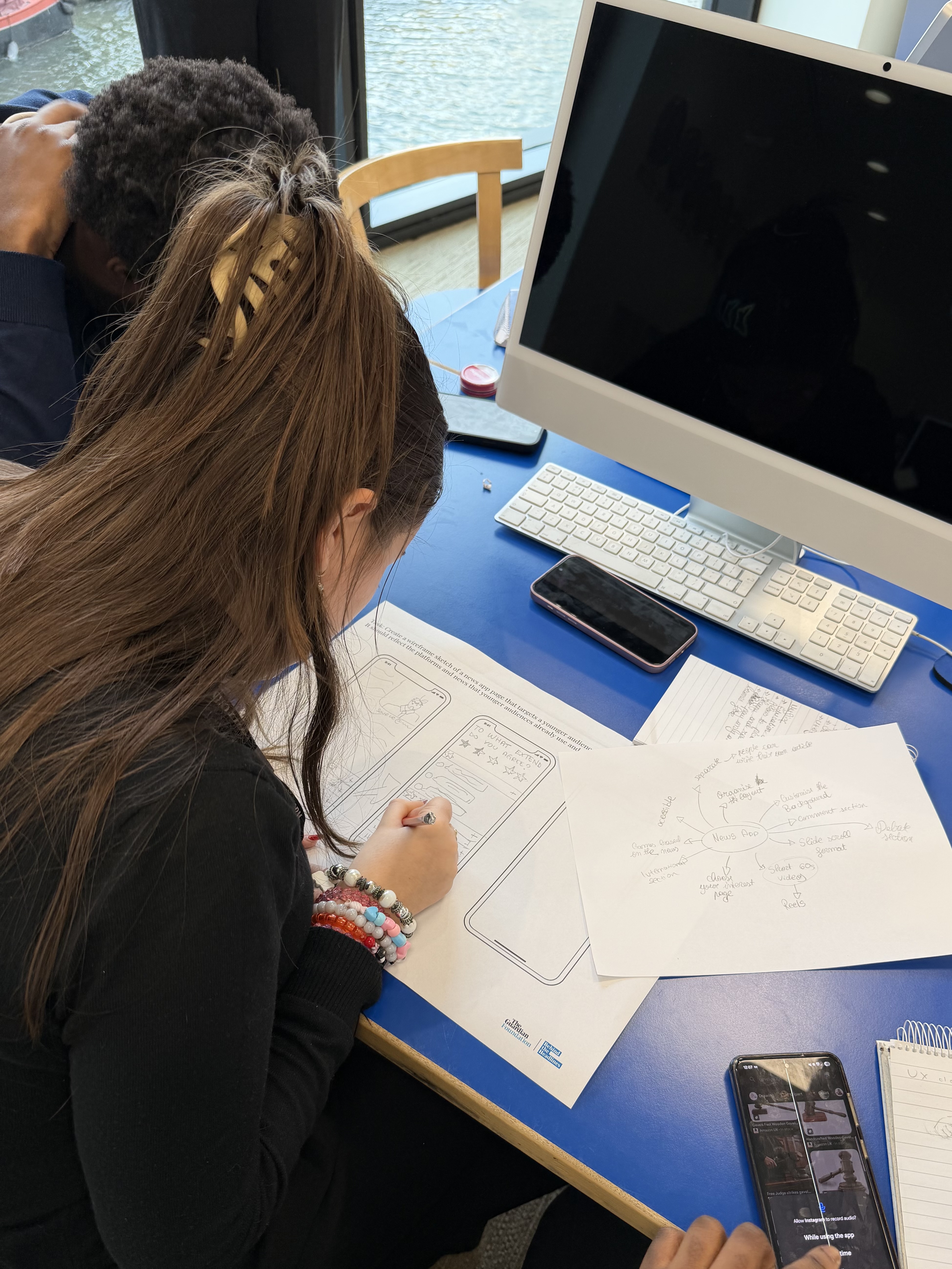 Student working on how they can create a new app interface