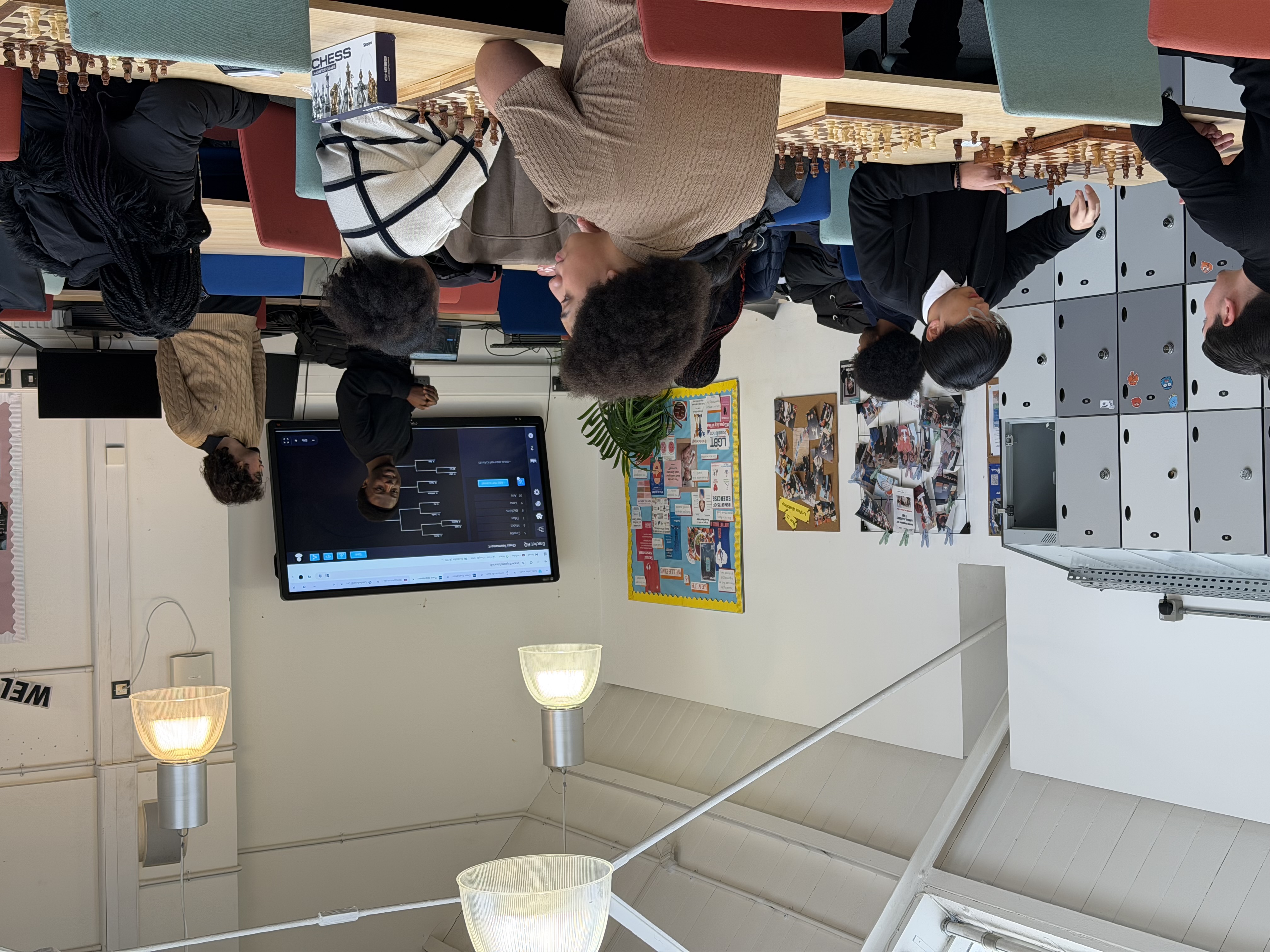 A group of students listening