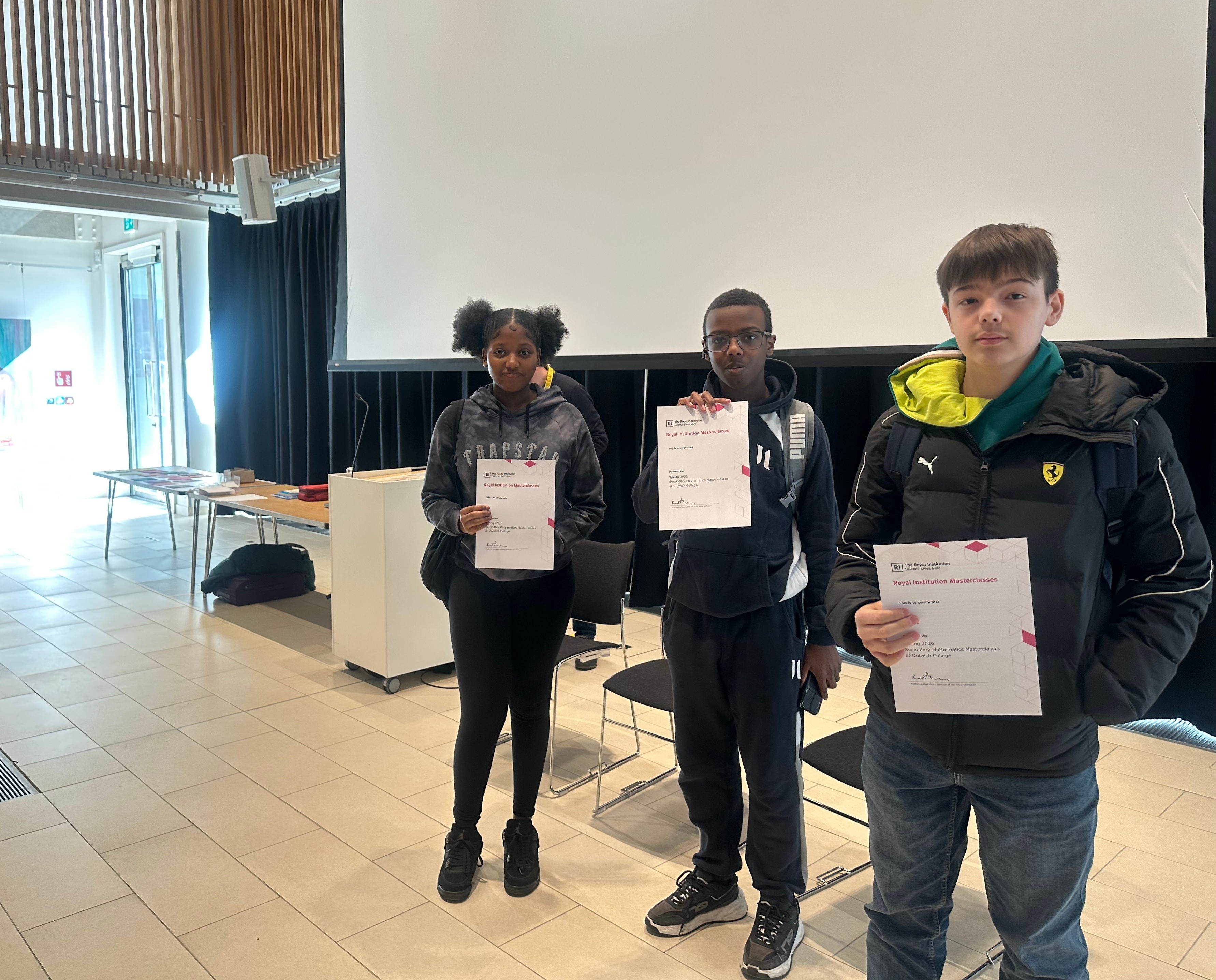 Students holding on to their certs