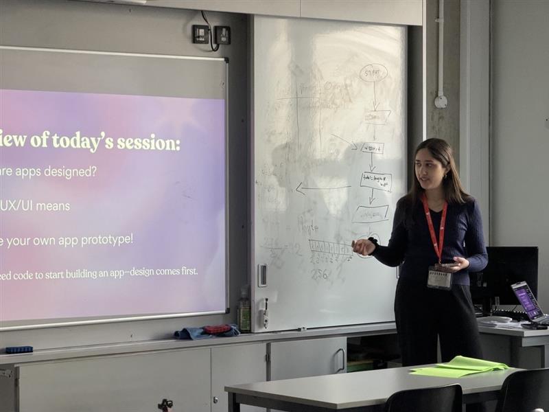 Presenter giving a talk on apps