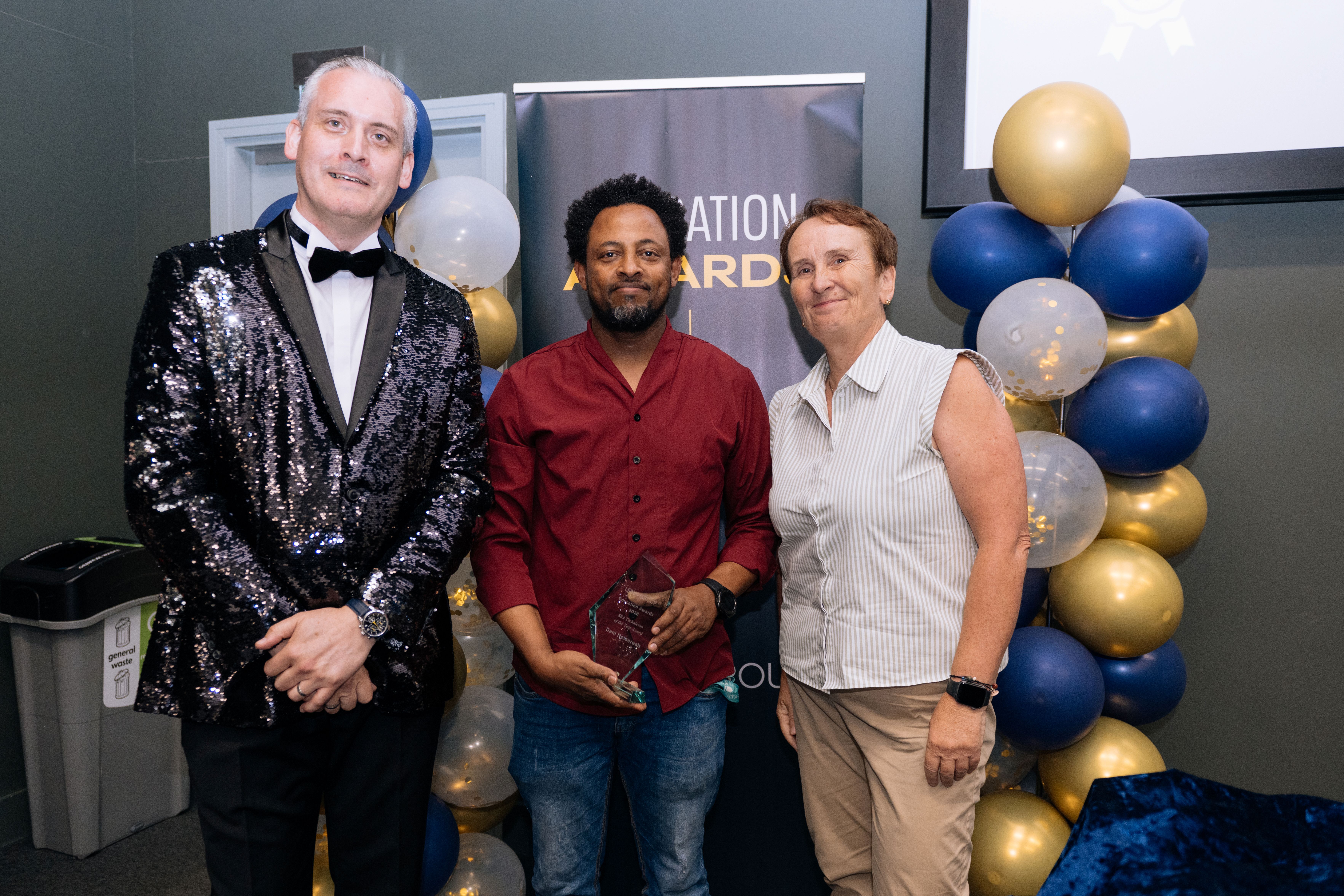 Mr D Netsereab receiving award