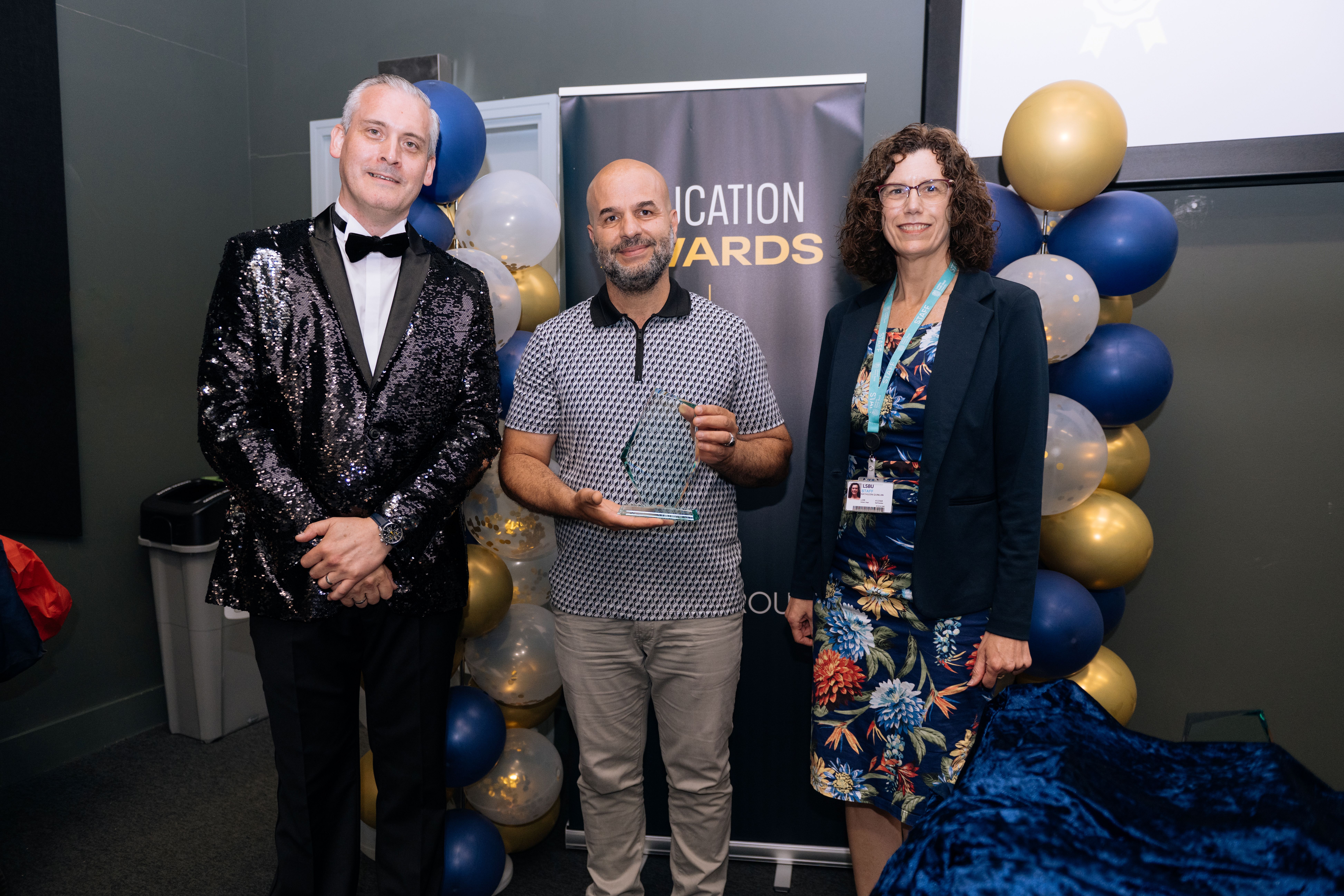 Mr N Rezig receiving award