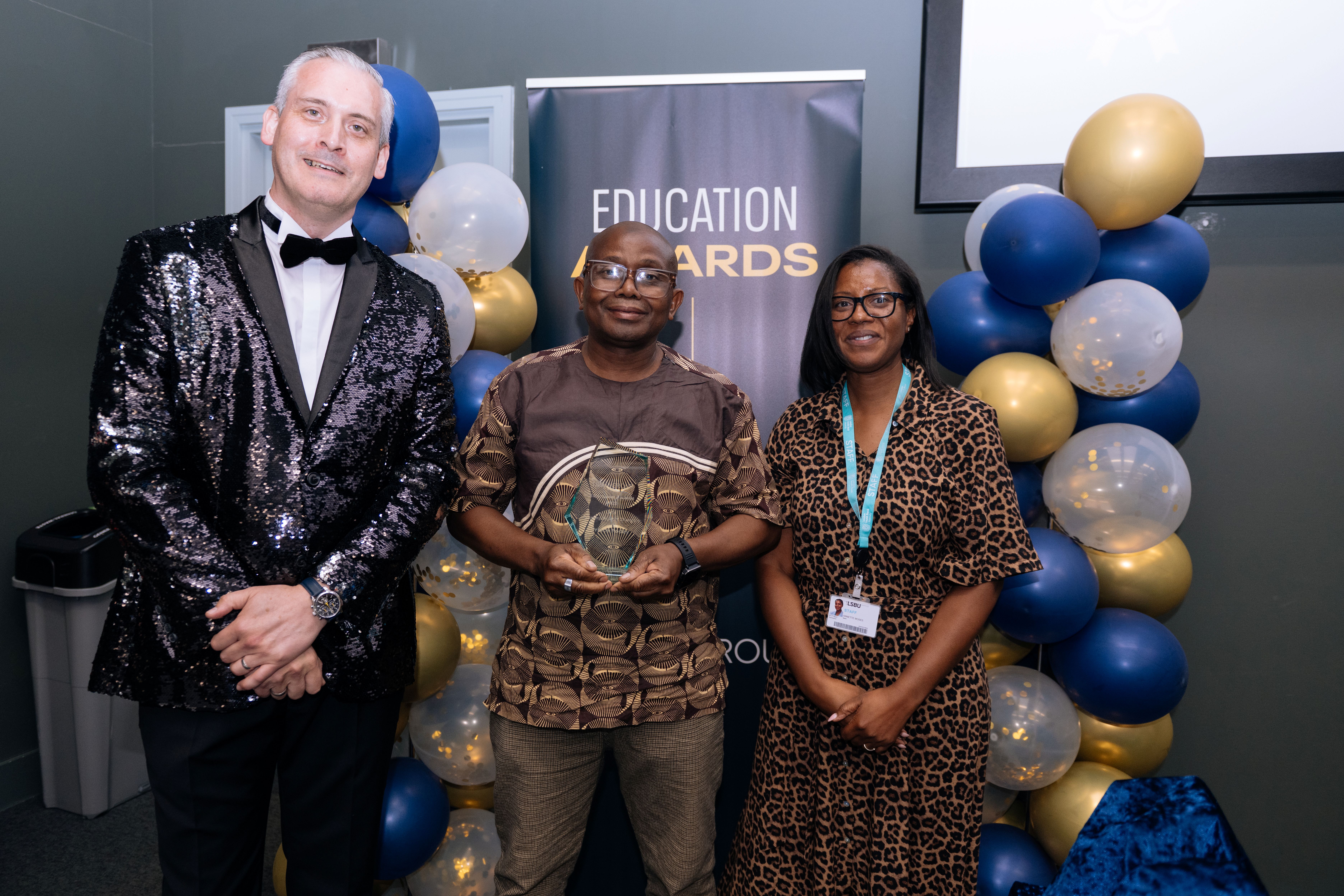 Mr P Foday receiving award