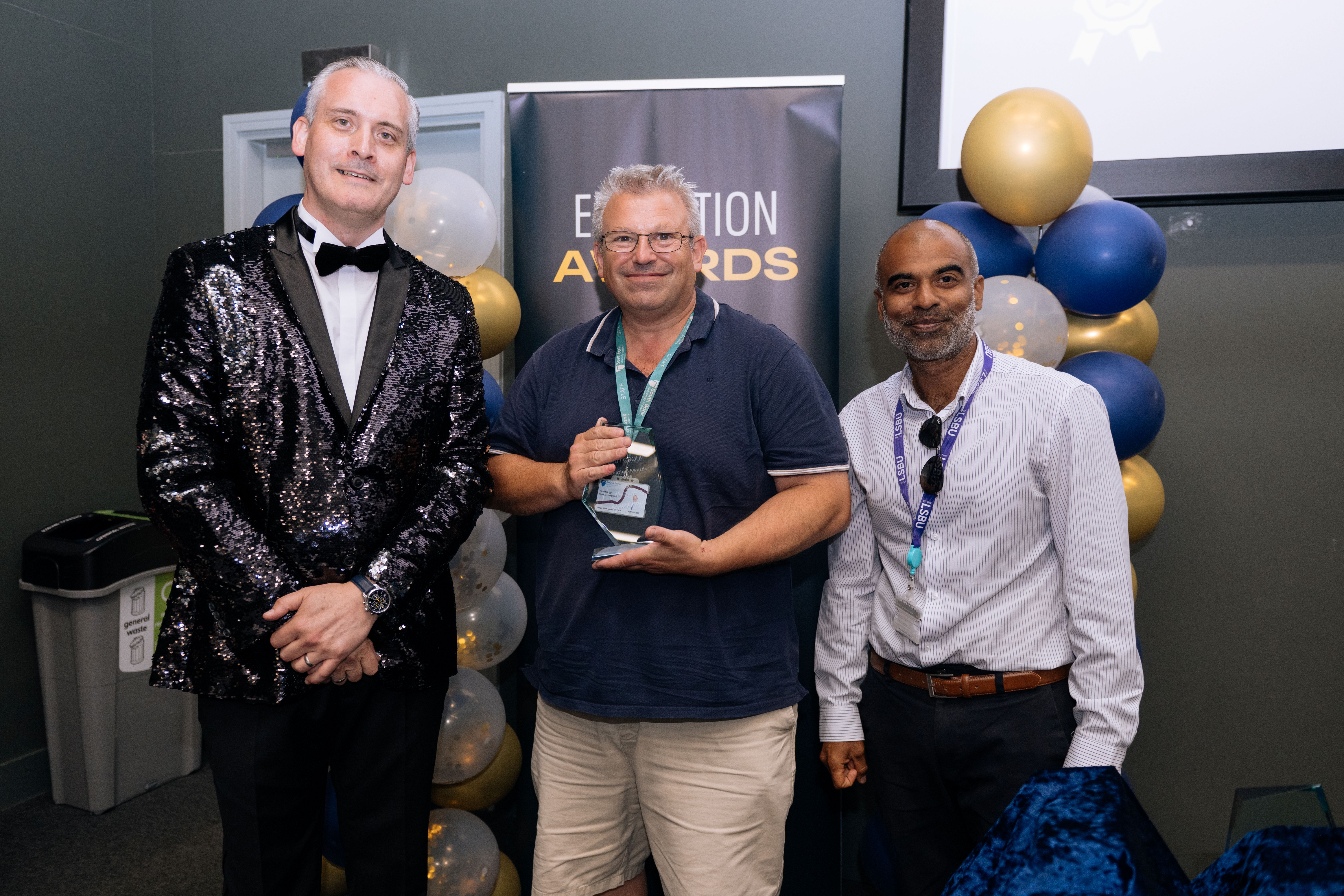 Mr S Hogg receiving award