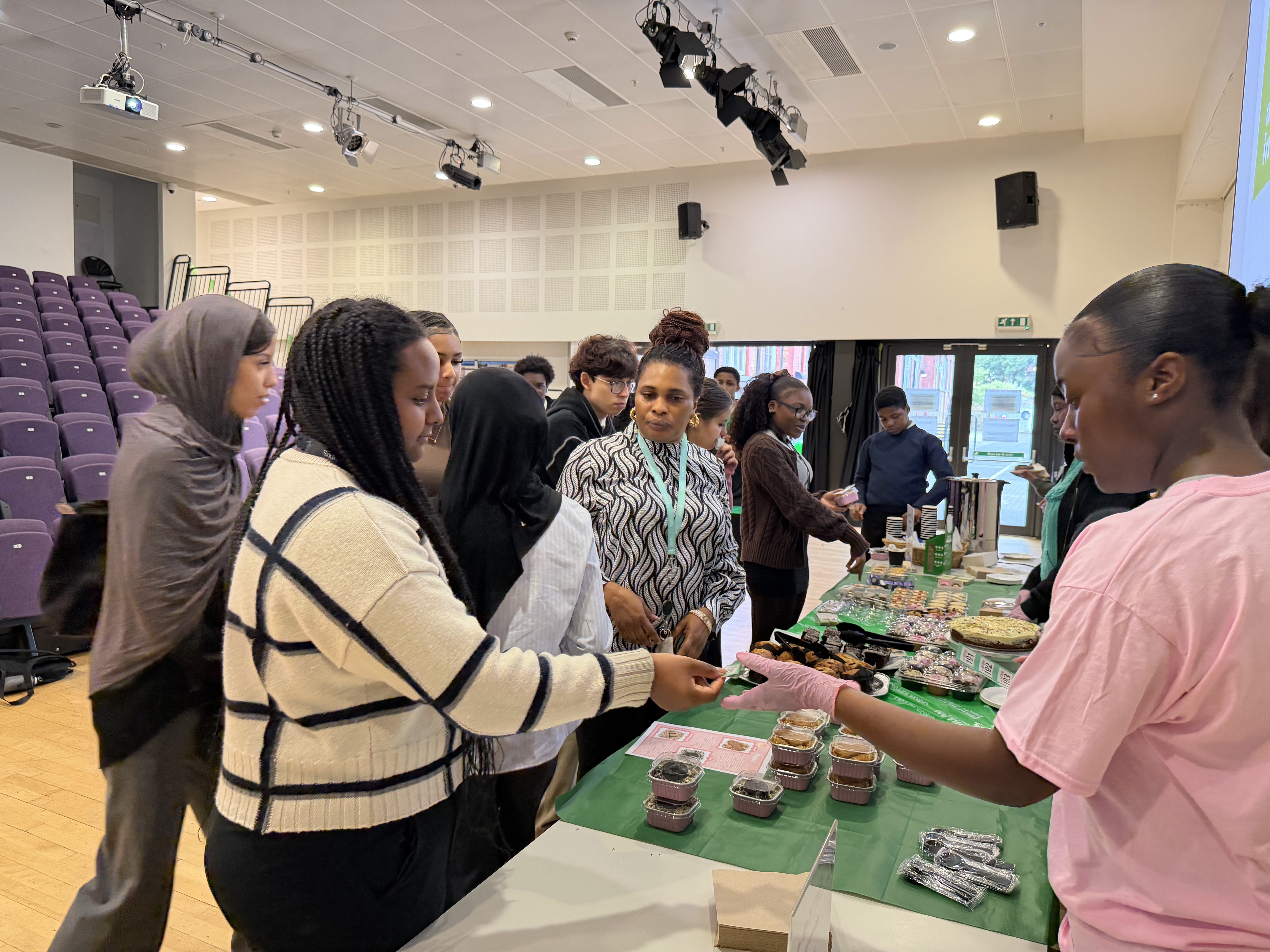 Student purchasing cakes