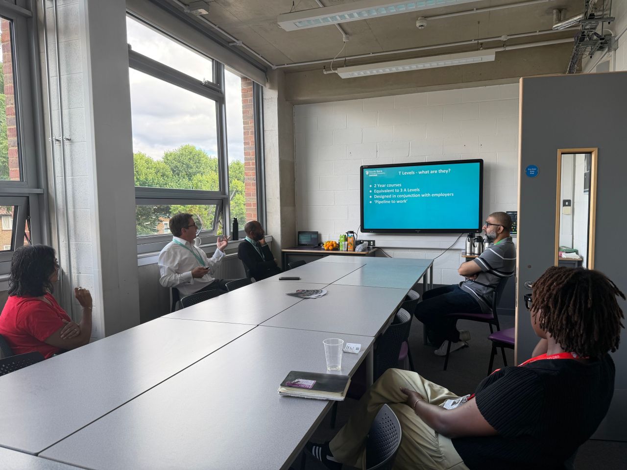 People listening into presentation