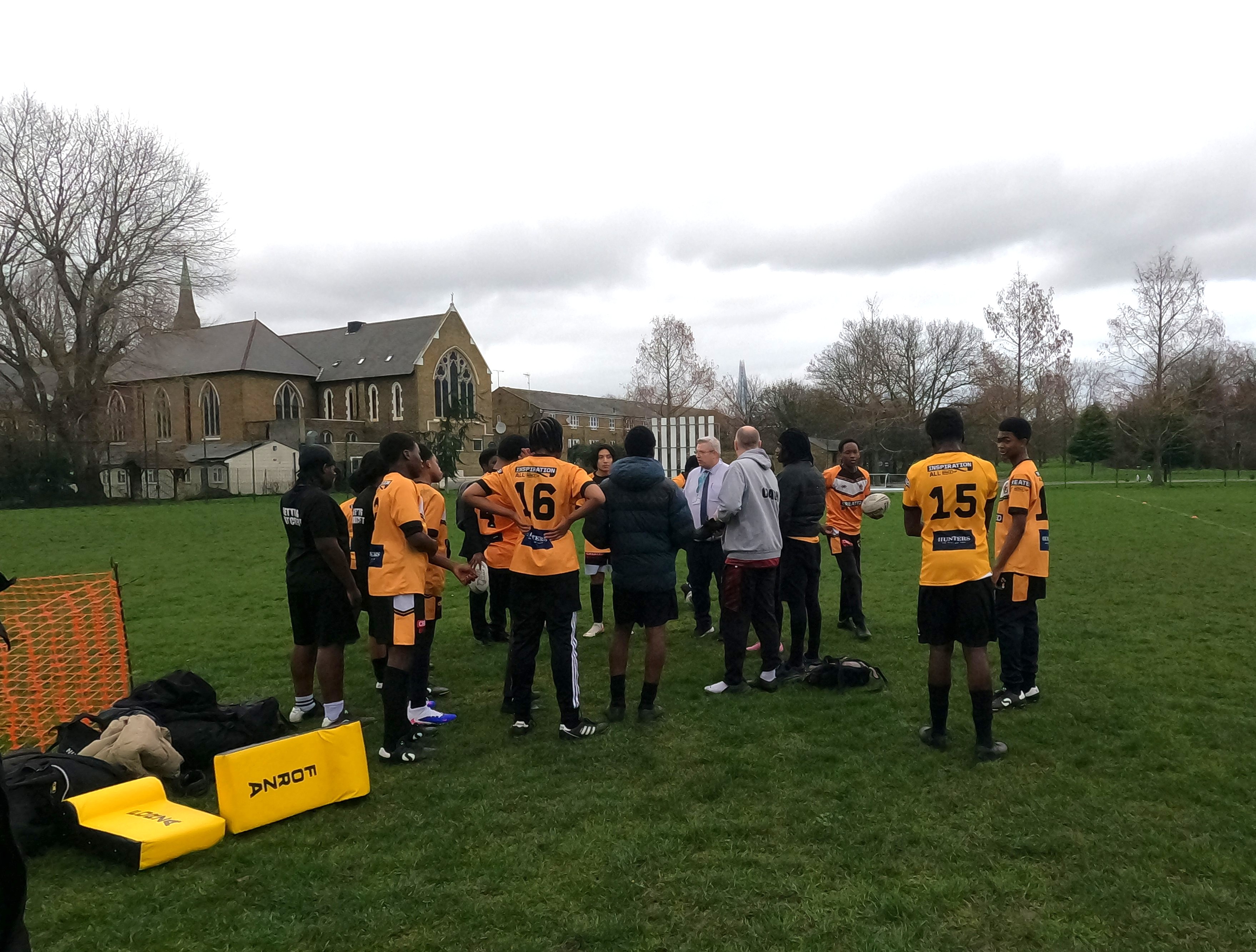 Rugby team in ther briefing session before the match