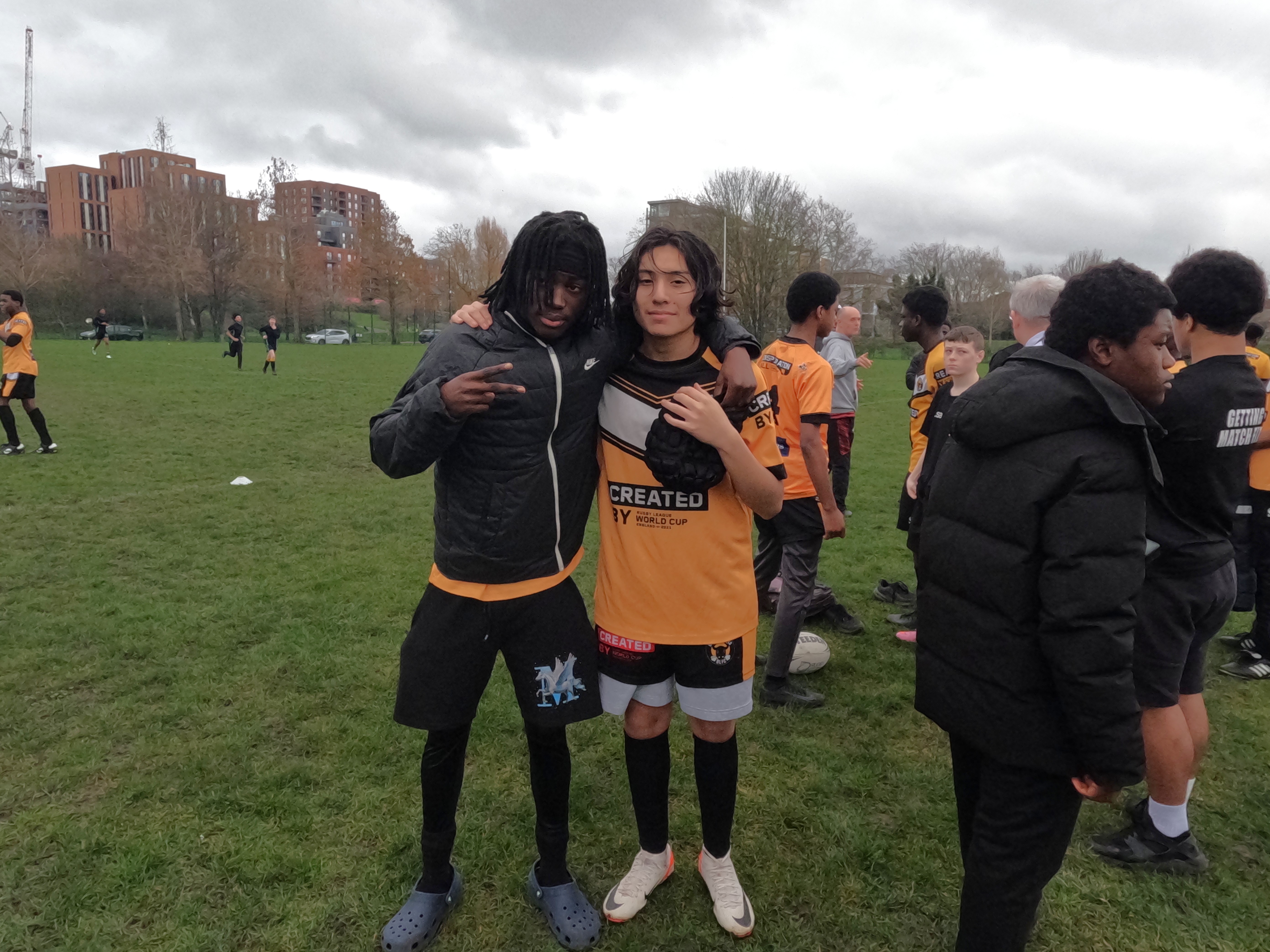 Student posing in front of camera before the start of their rugby match
