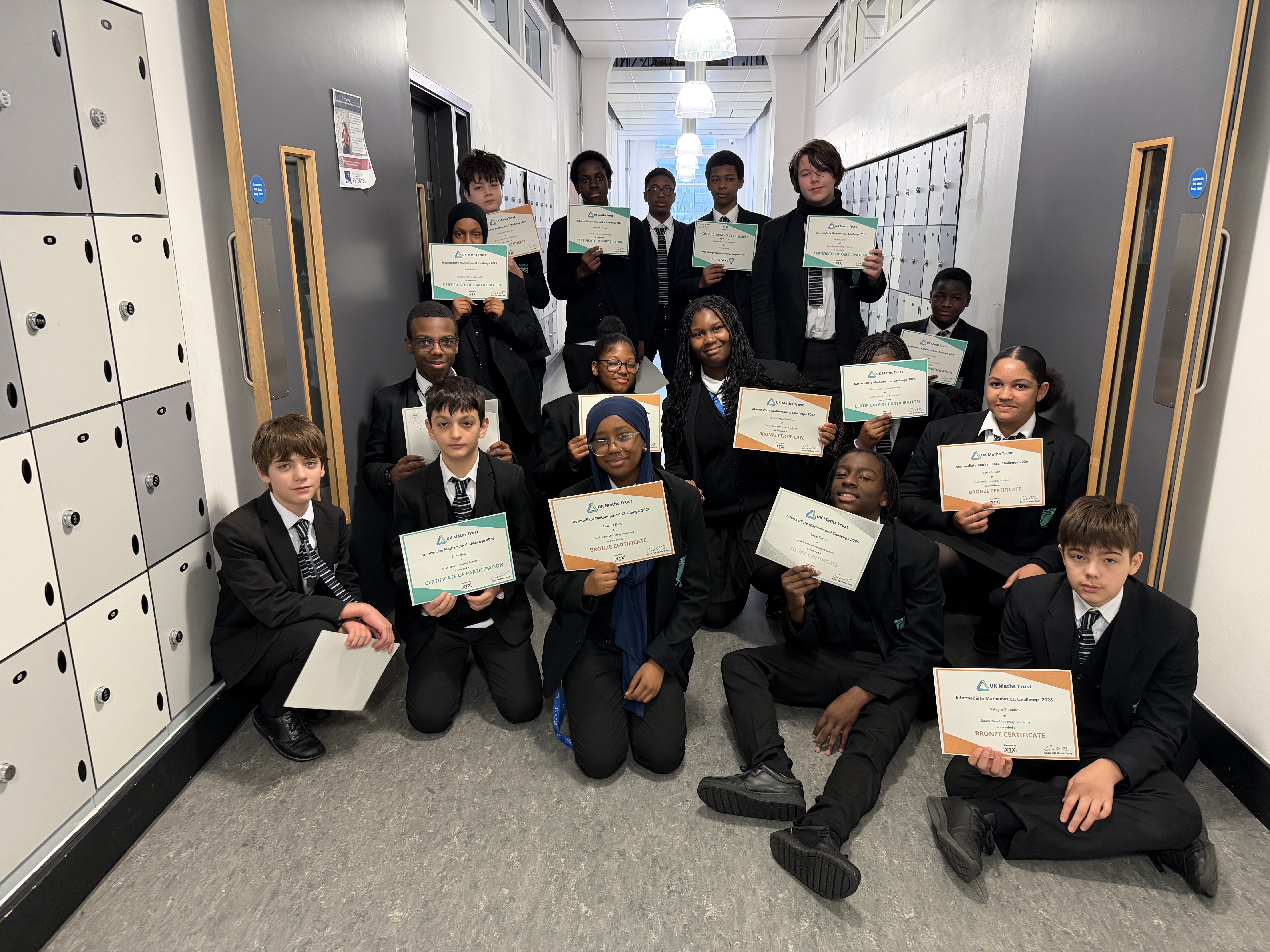 Year 9 group photo of students with their UKMT certificates