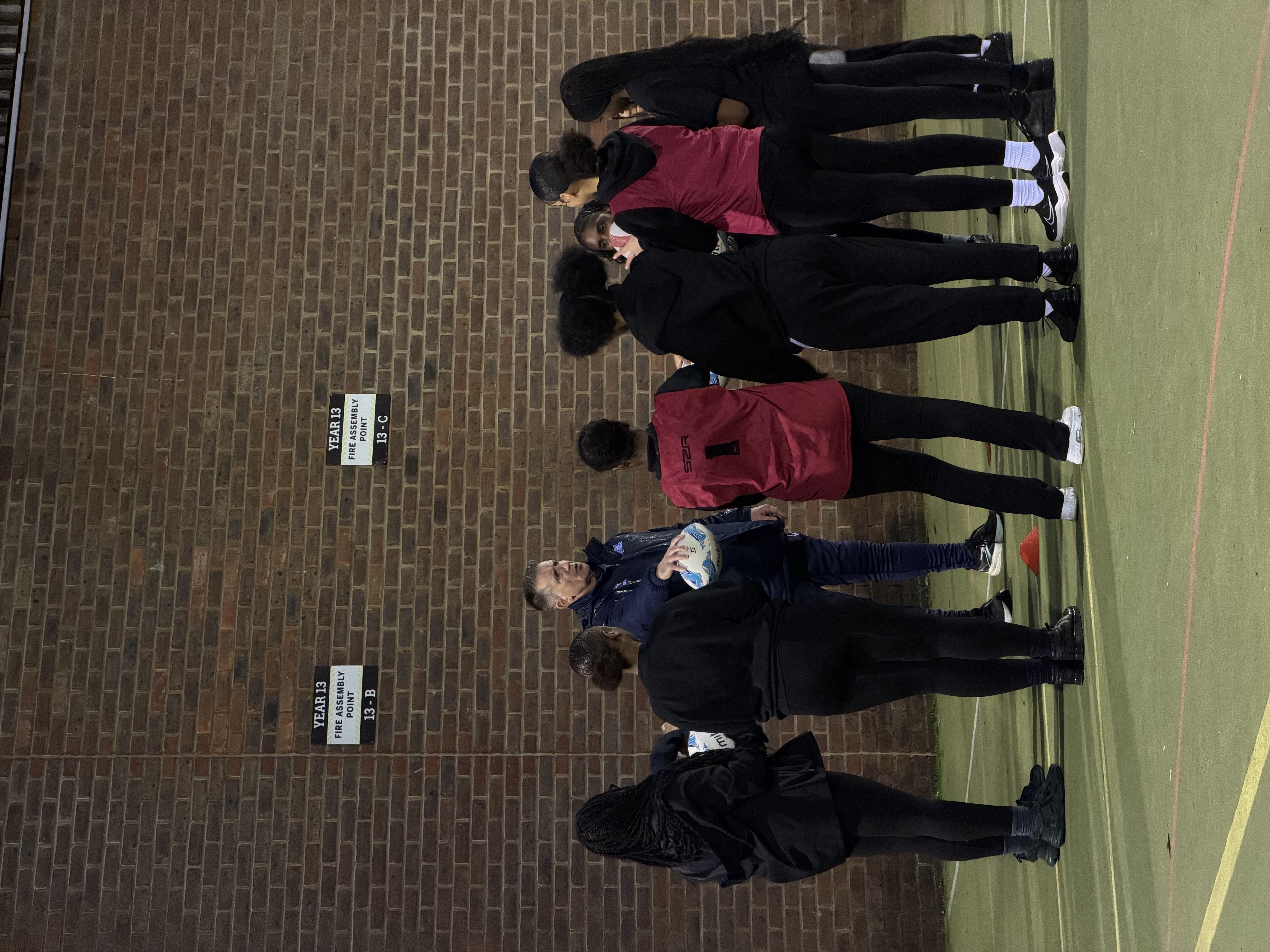 Year 10 rugby girls student in the rugby briefing