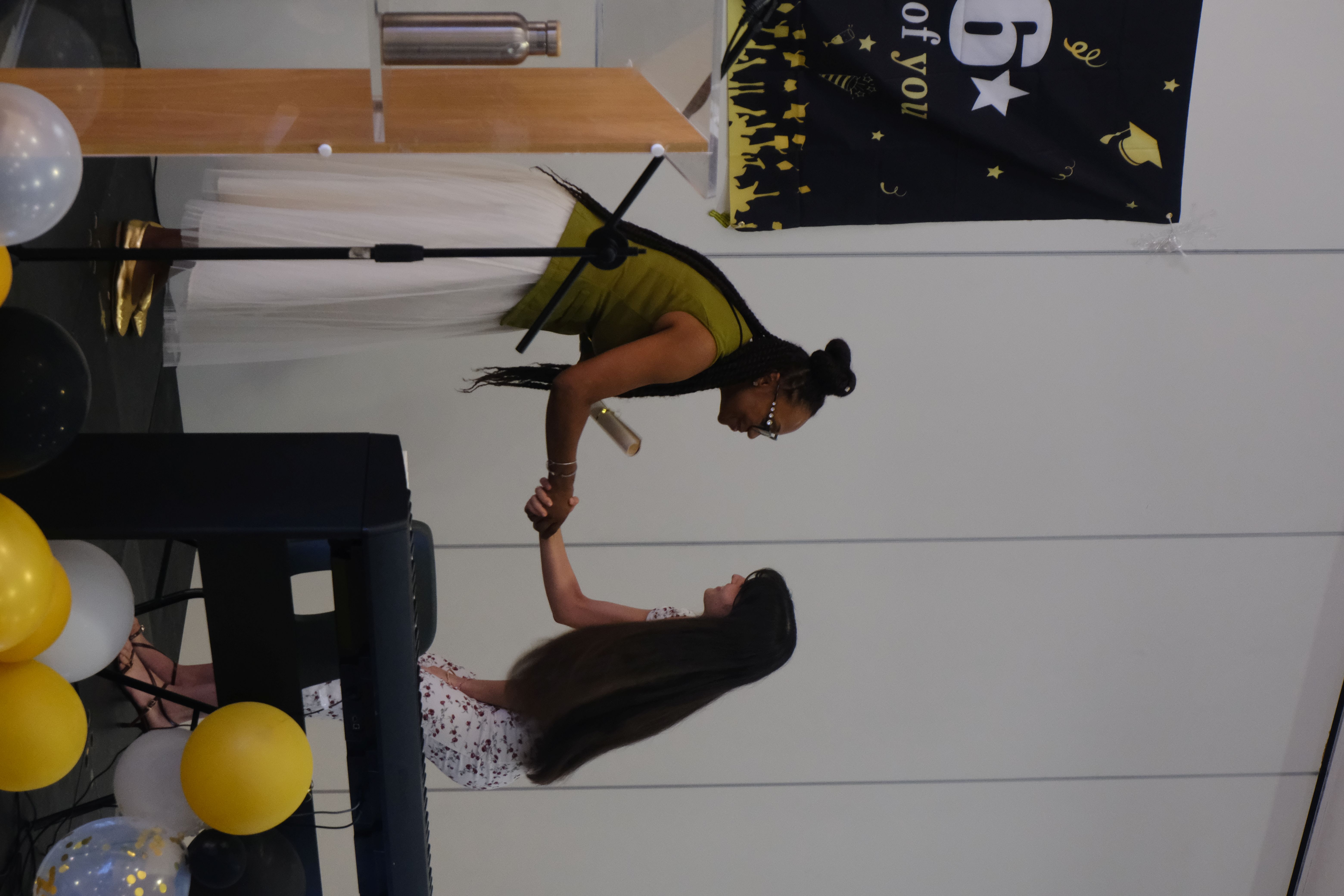 Student handshake to receive certificate