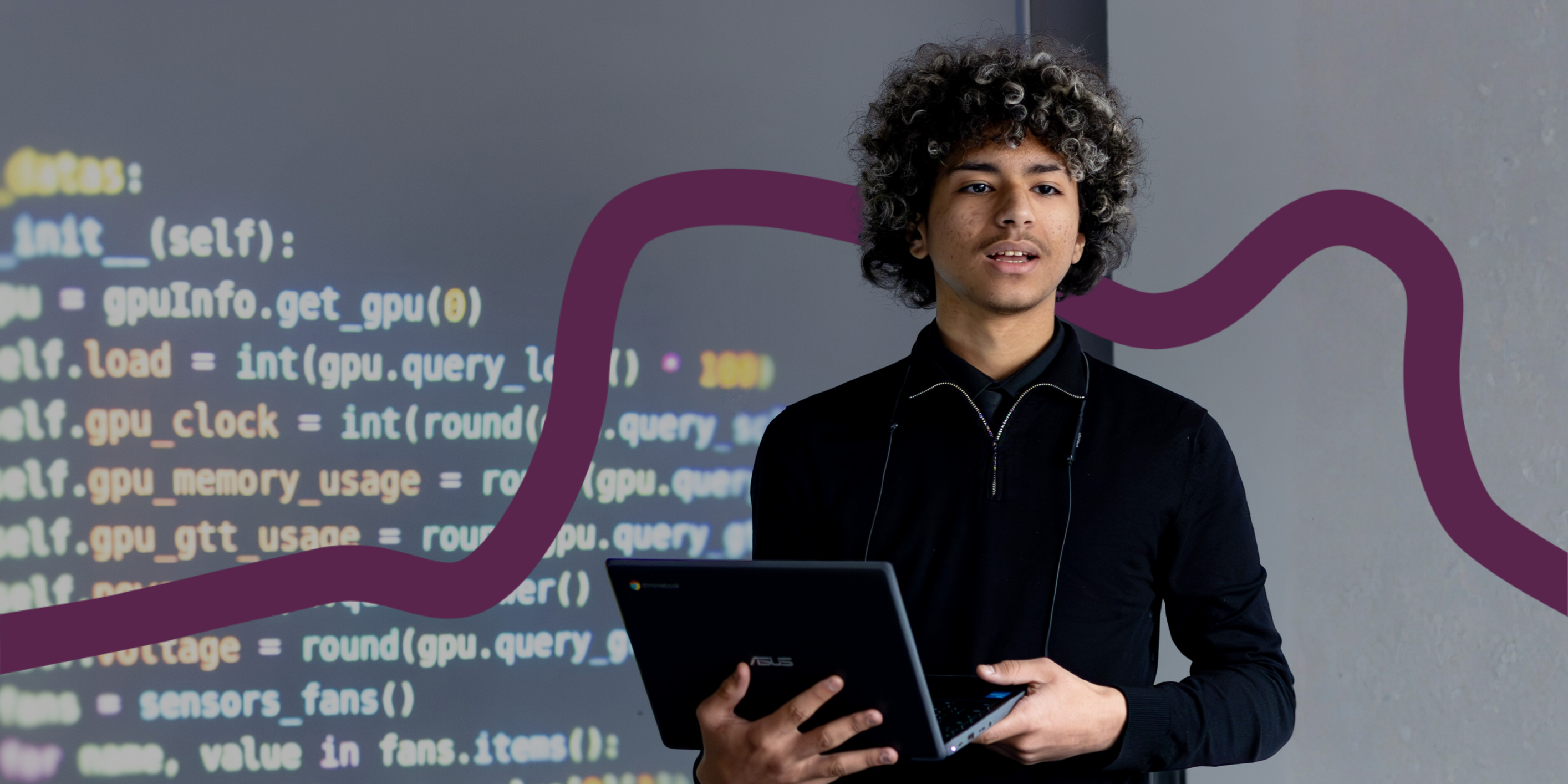 Student using laptop during a presentation