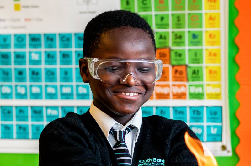 Student with fire in hands