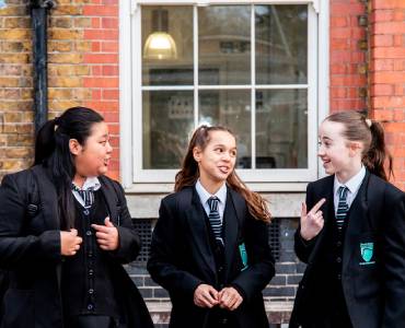 Female students chatting outside