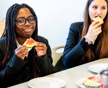 Students enjoying fruit snacks