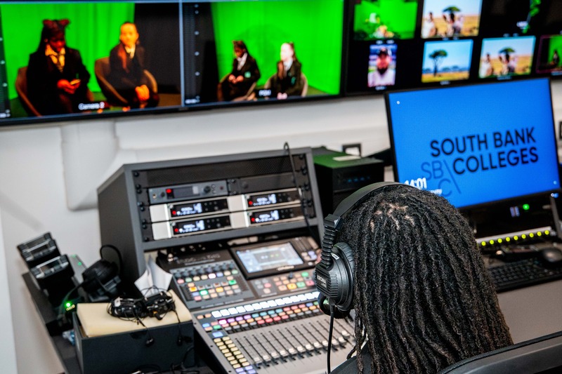 Student working with audio equipment