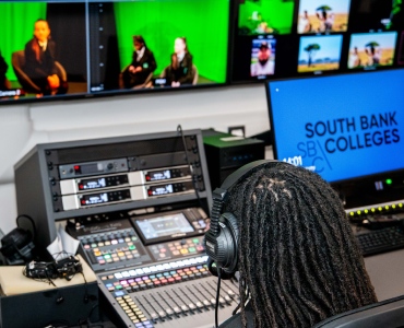 Student working with audio equipment
