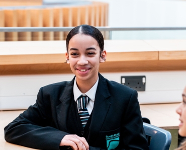 Smiling student looking at camera