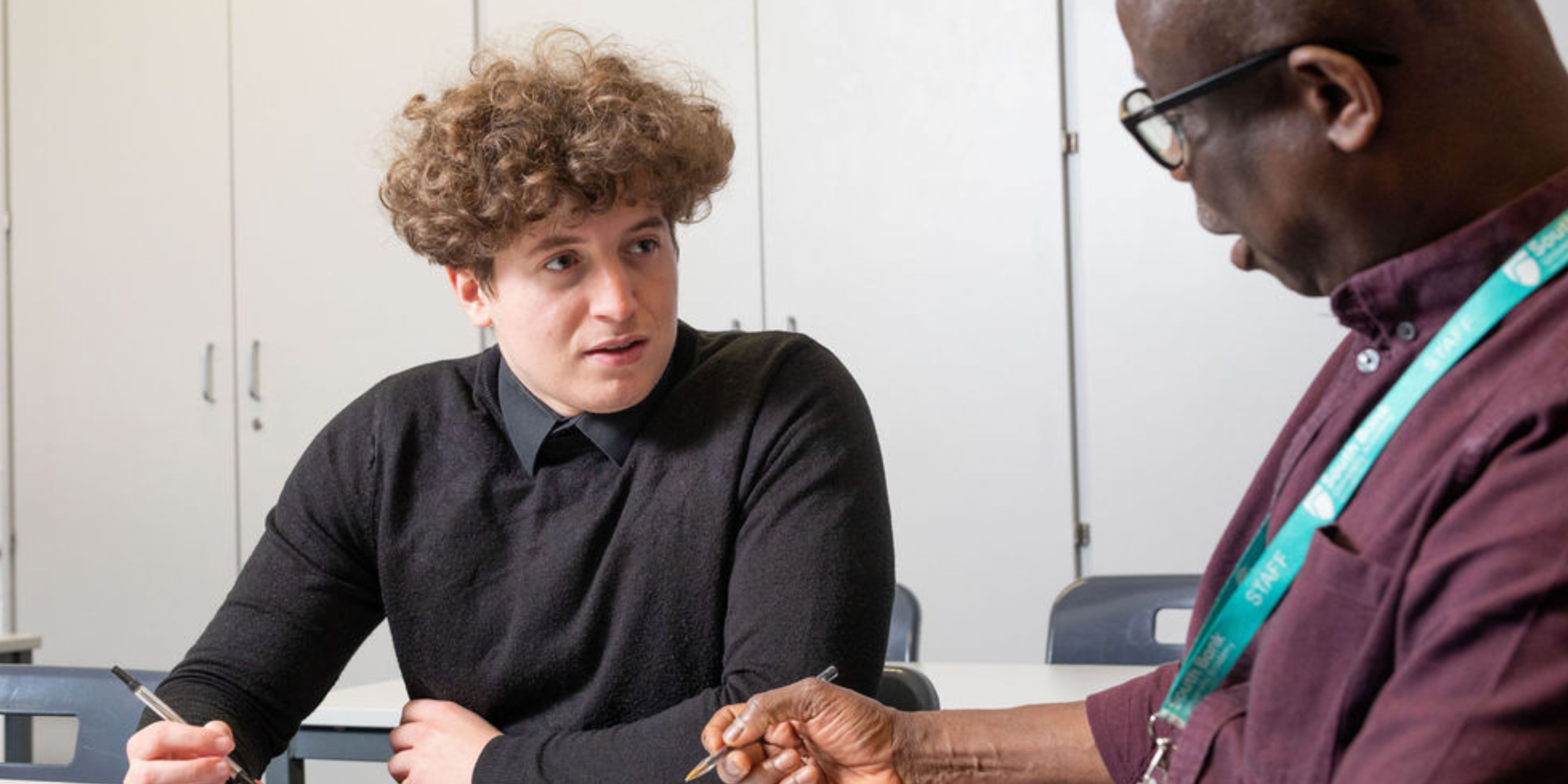 Student getting help from tutor